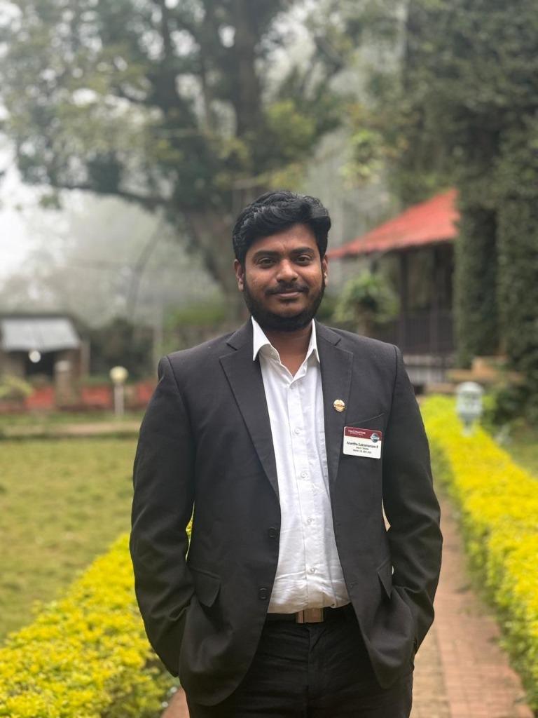 Ananth in a scenic outdoor setting